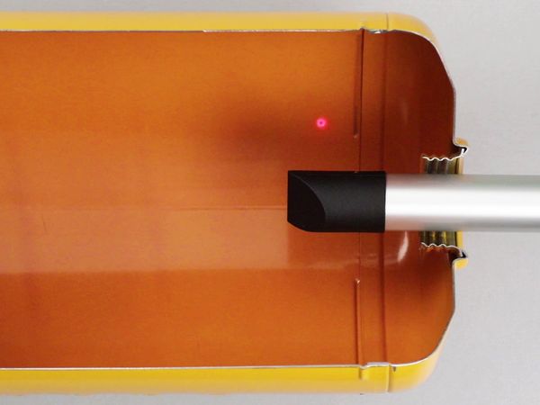 PaintChecker Industrial Tube measures coating thickness inside a spray bottle